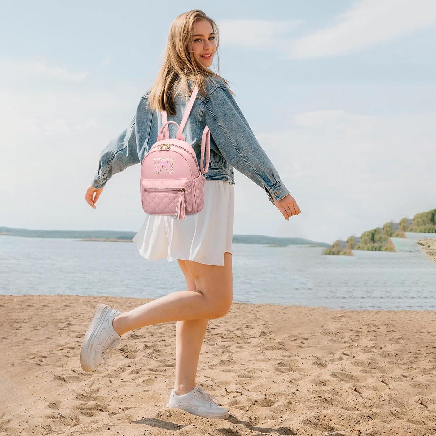 imageI IHAYNER Girls Bowknot Cute Leather Backpack Mini Backpack Purse for Women Small Bookbag Travel Daypacks with Charm Tassel PurplePink